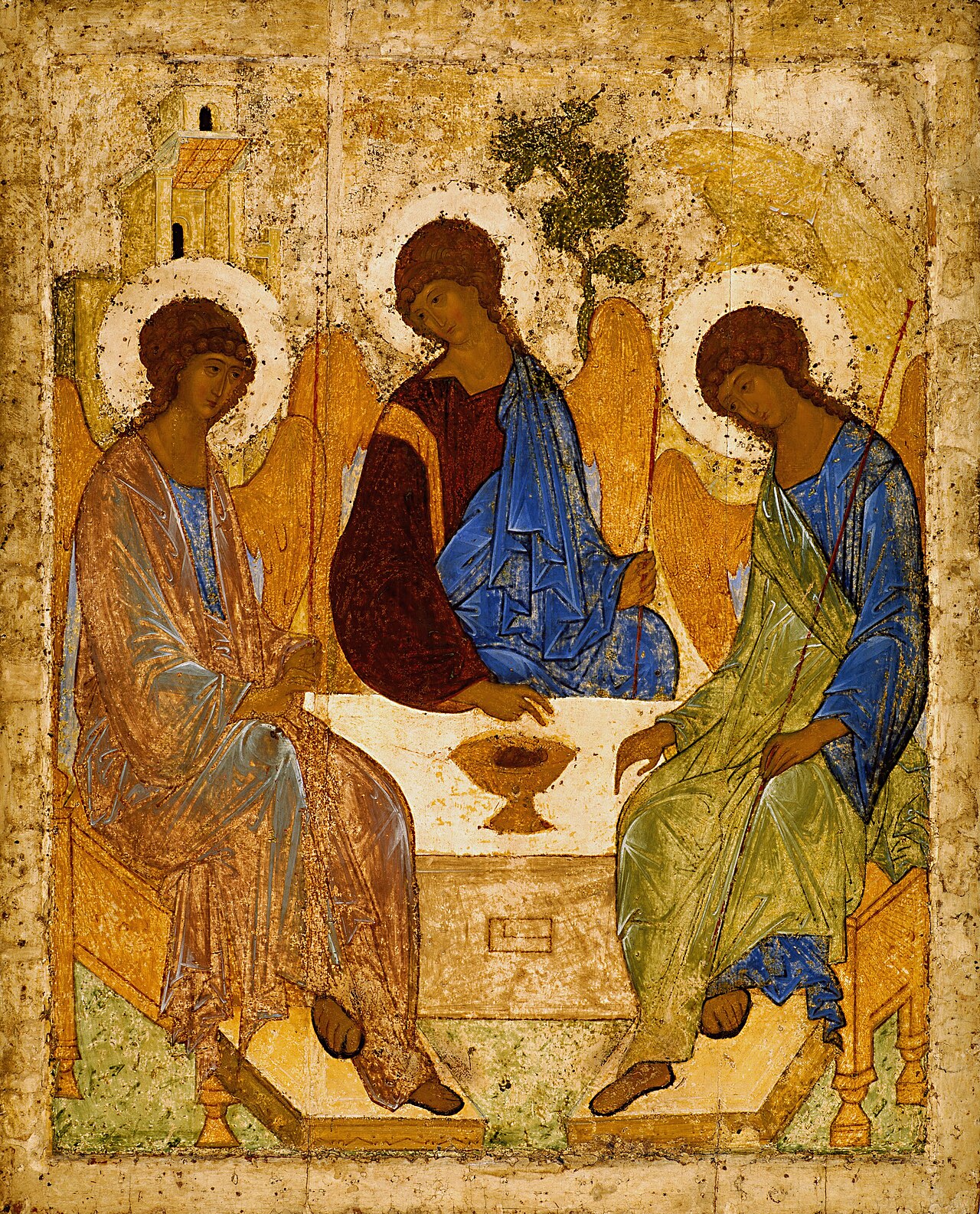 Andrei Rublev's Trinity icon: three angels seated around a table with a chalice, before the house, the oak, and the mountain.