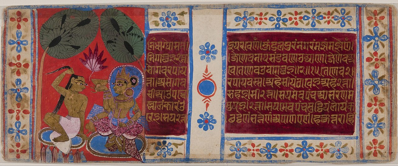 A painted folio from a Jain Kalpasutra manuscript: on a red ground, a miniature shows Mahavira pulling out his hair at his initiation beside a seated crowned figure under two trees, next to gold-on-red text panels with floral borders.