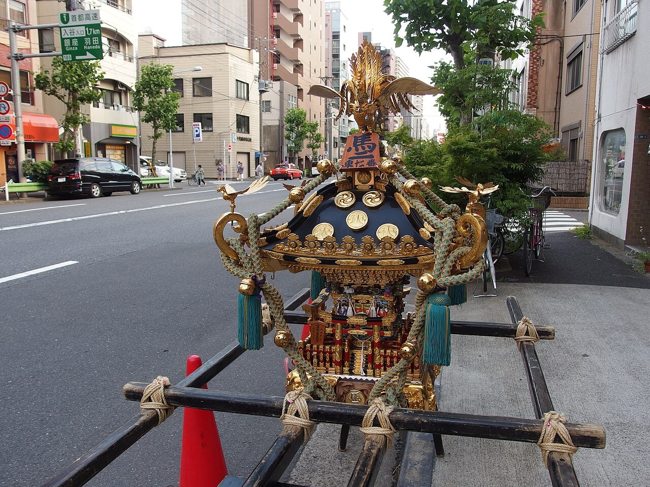 A mikoshi portable shrine carried through Asakusa at Sanja Matsuri.