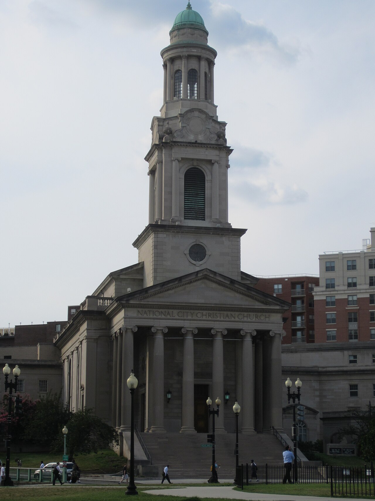 National City Christian Church in Washington, D.C., its columned portico and green-domed tower on the street.