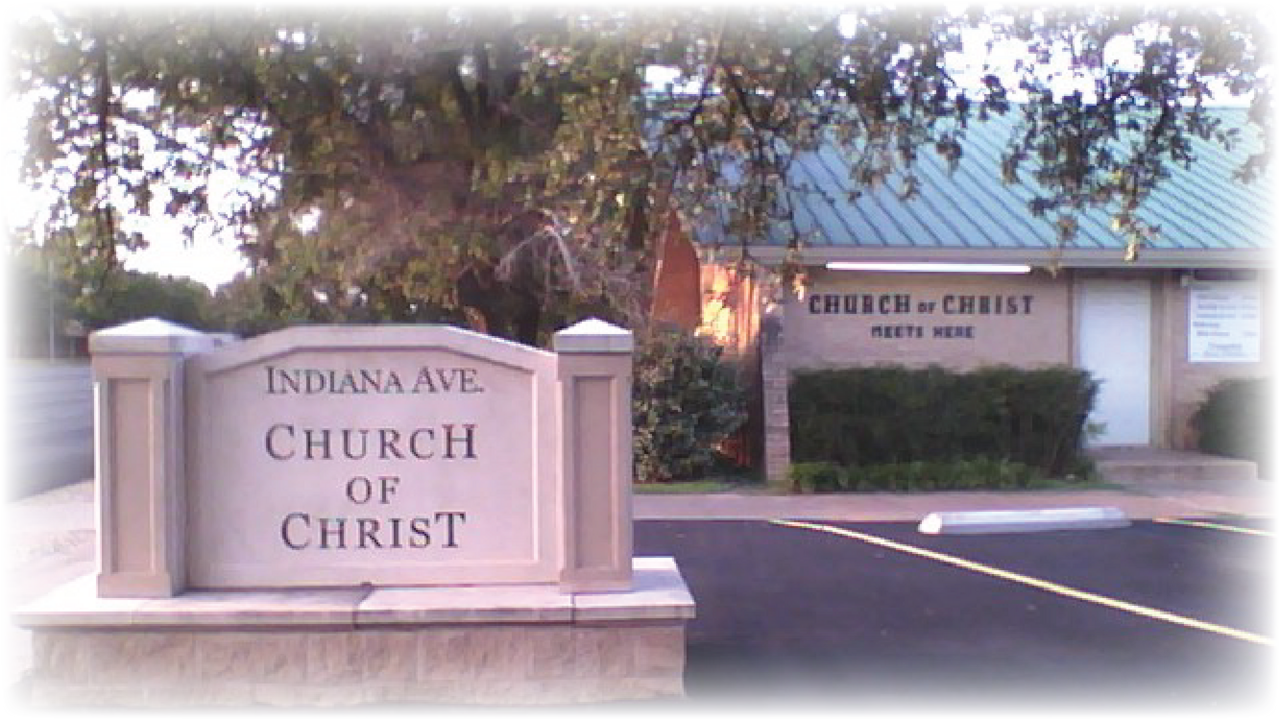 The Indiana Avenue Church of Christ in Lubbock, Texas: the congregation's sign, with its meeting house behind.