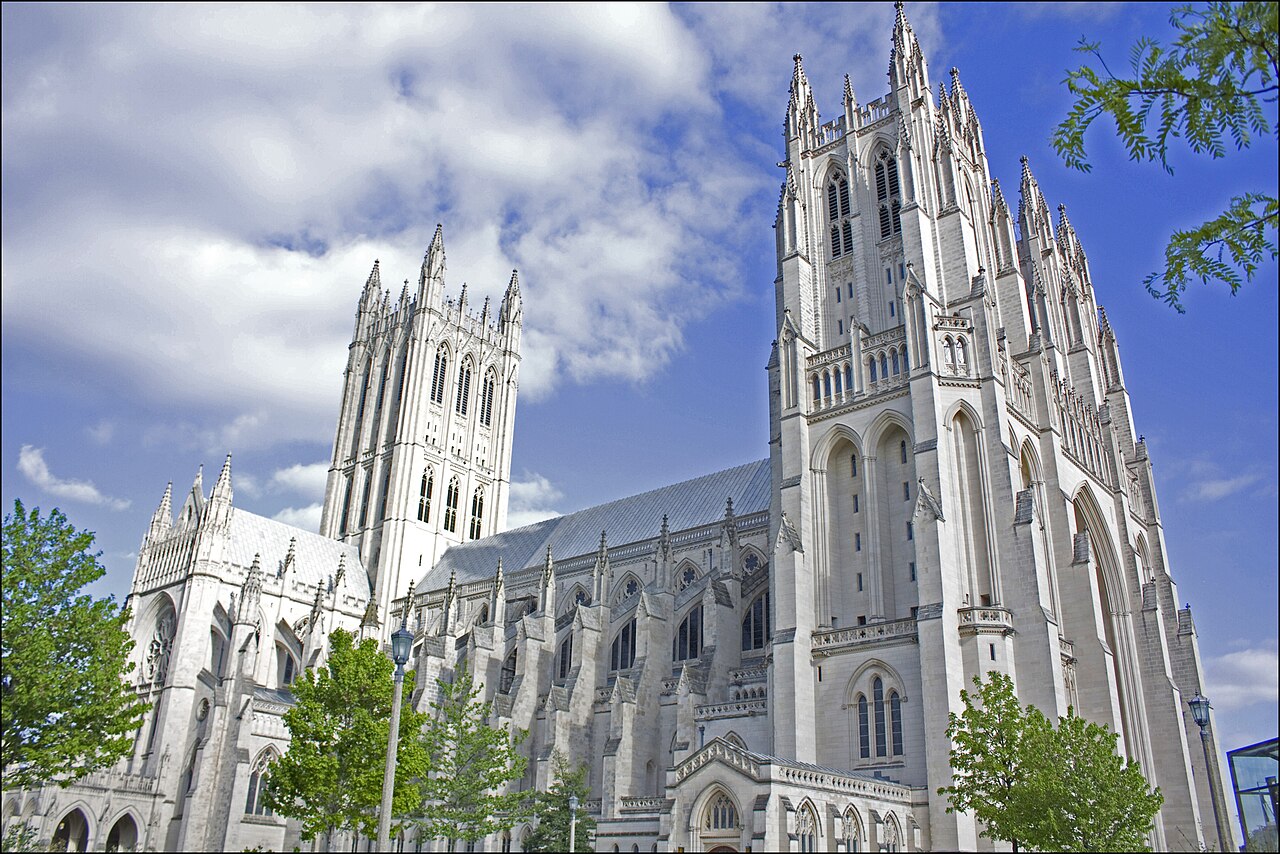 The Washington National Cathedral against a blue sky.