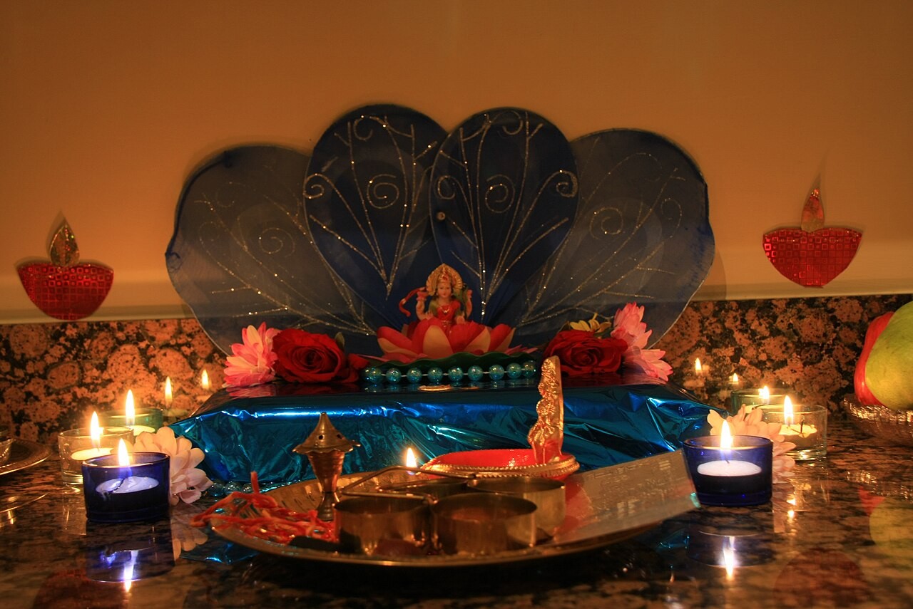 An image of the goddess Lakshmi installed in a home for Diwali pūjā.