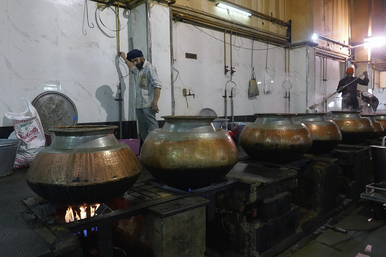 The langar hall at Gurdwara Bangla Sahib in Delhi, where volunteers serve a free meal to all.