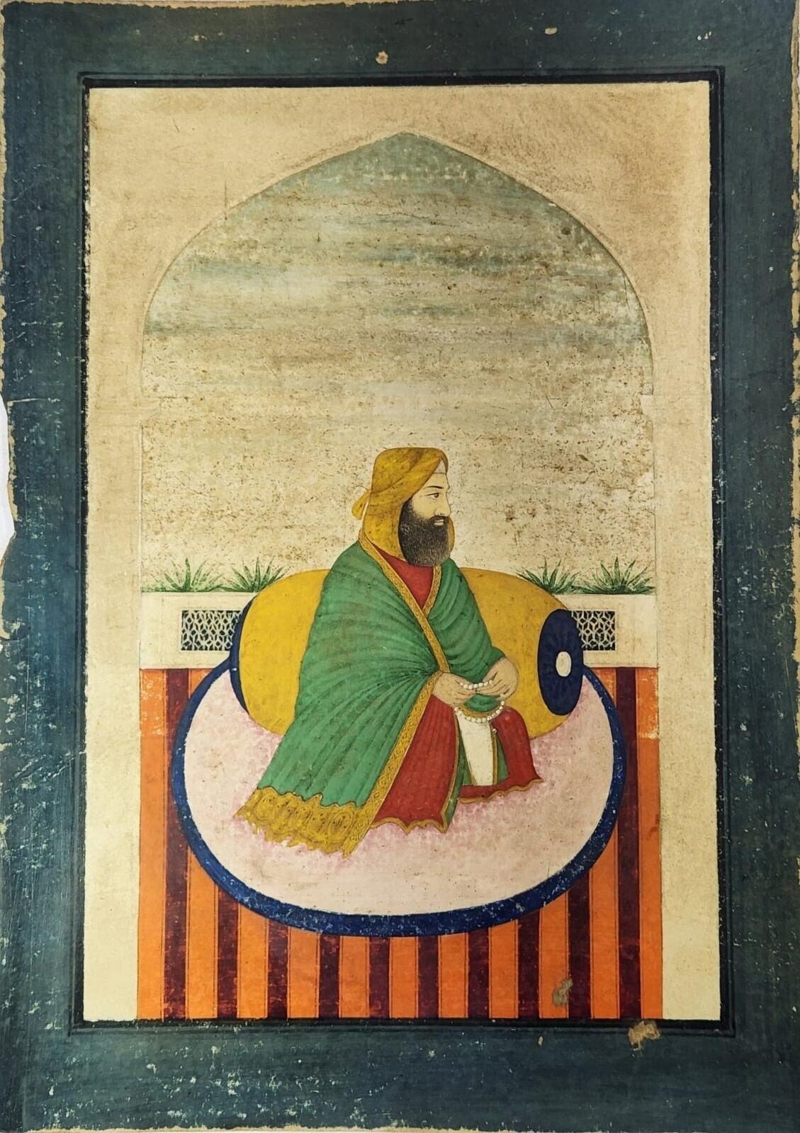 A 19th-century miniature of a Sikh seated in meditation, holding a mālā of prayer beads.