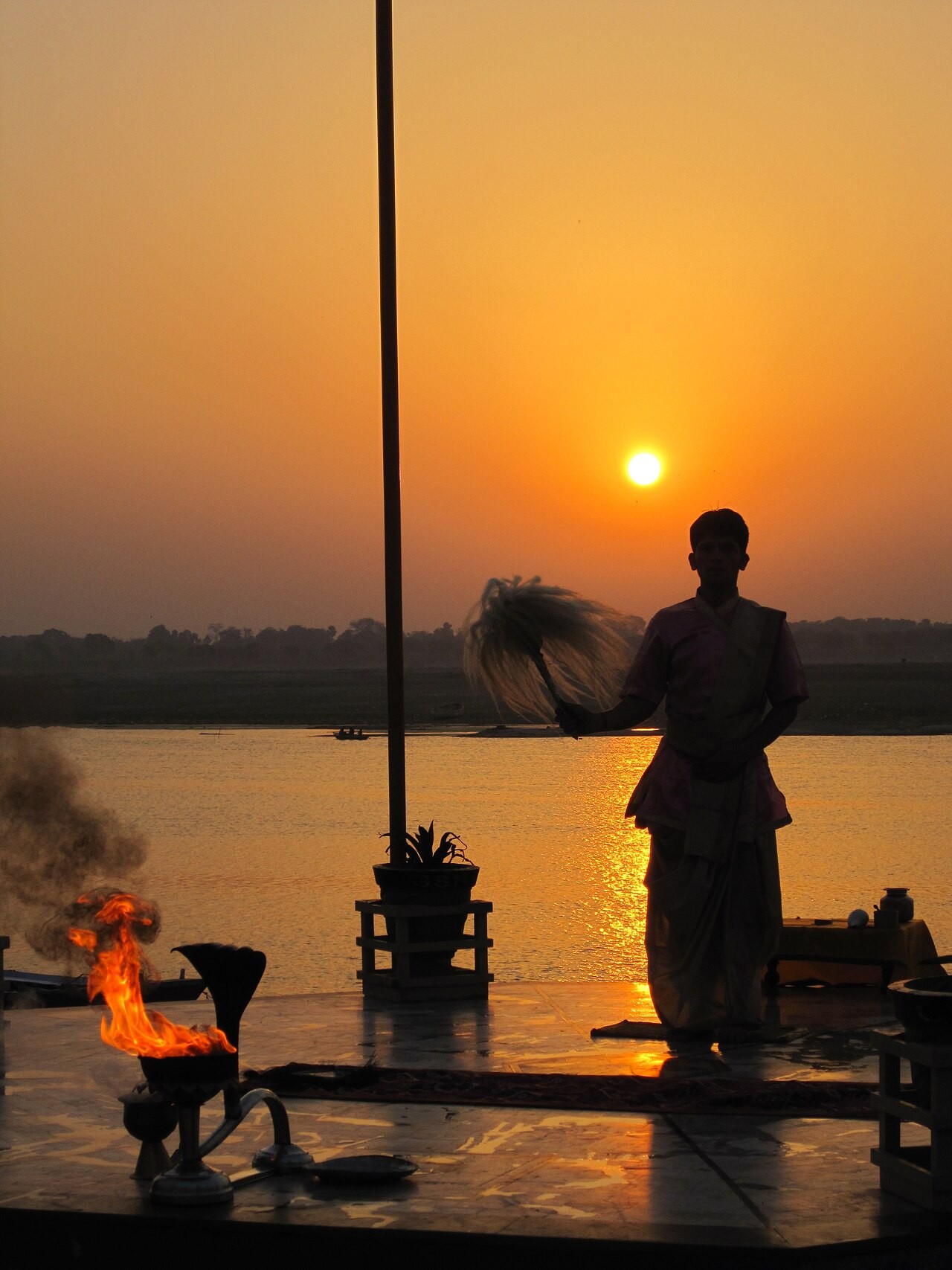 Morning worship of the Ganges at sunrise in Varanasi.