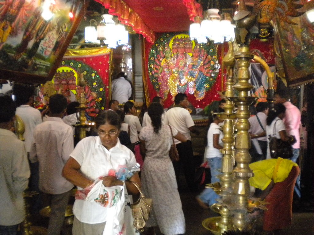 Devotees observing Poya, the full-moon observance day, in Sri Lanka.