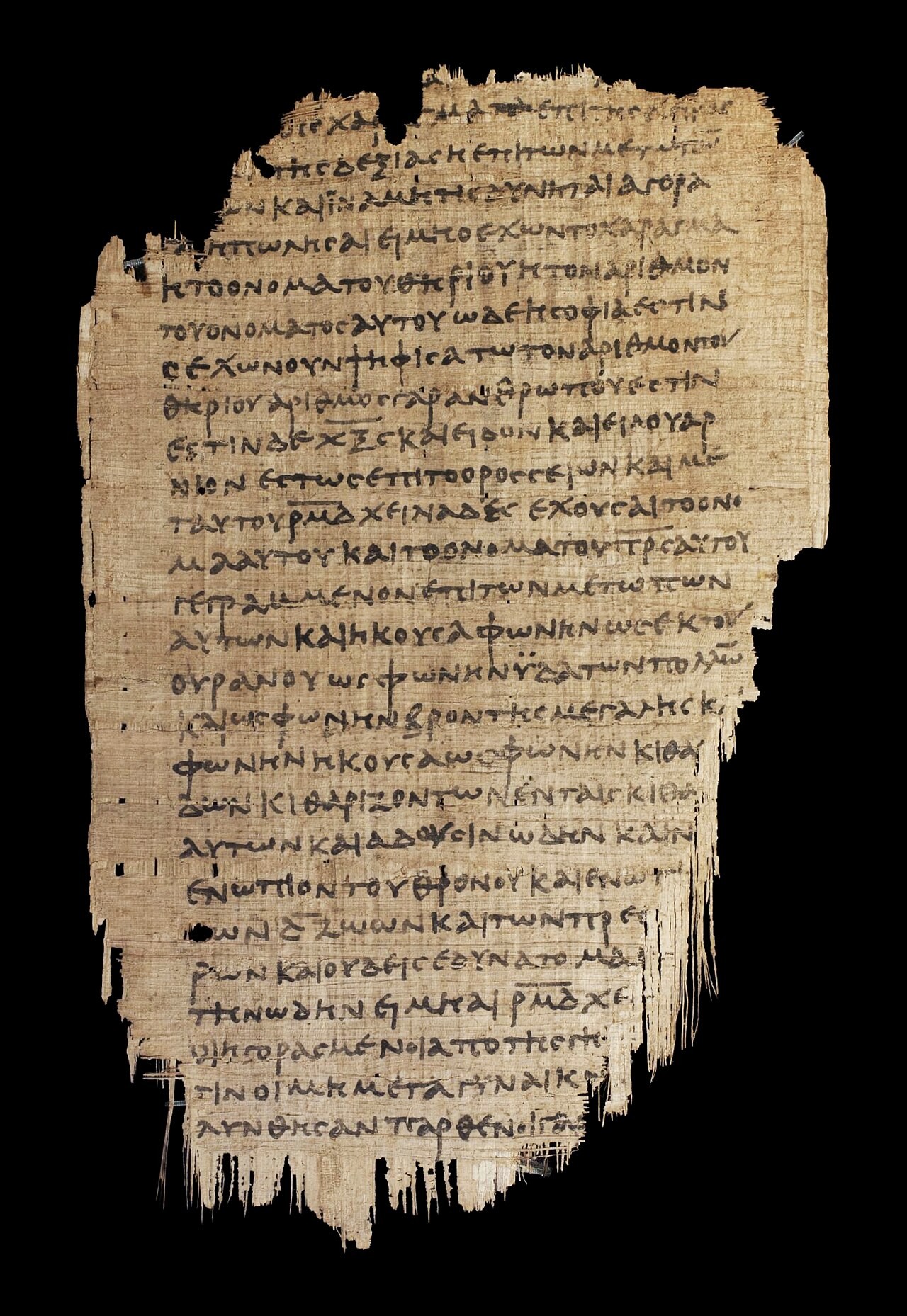 A folio of Papyrus 47 in the Chester Beatty collection, a tattered sheet of brown papyrus covered in Greek uncial script from the Book of Revelation.