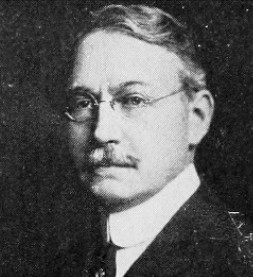 A halftone portrait of Condé B. Pallen, a man with round glasses and a mustache, editor of the New Catholic Dictionary.