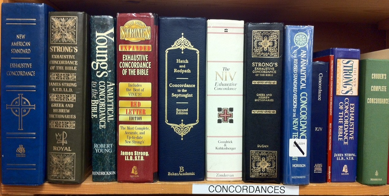 A library shelf labeled 'Concordances' holding the classic Bible concordances - Strong's, Young's, and Nave's among them - in hardcover editions.