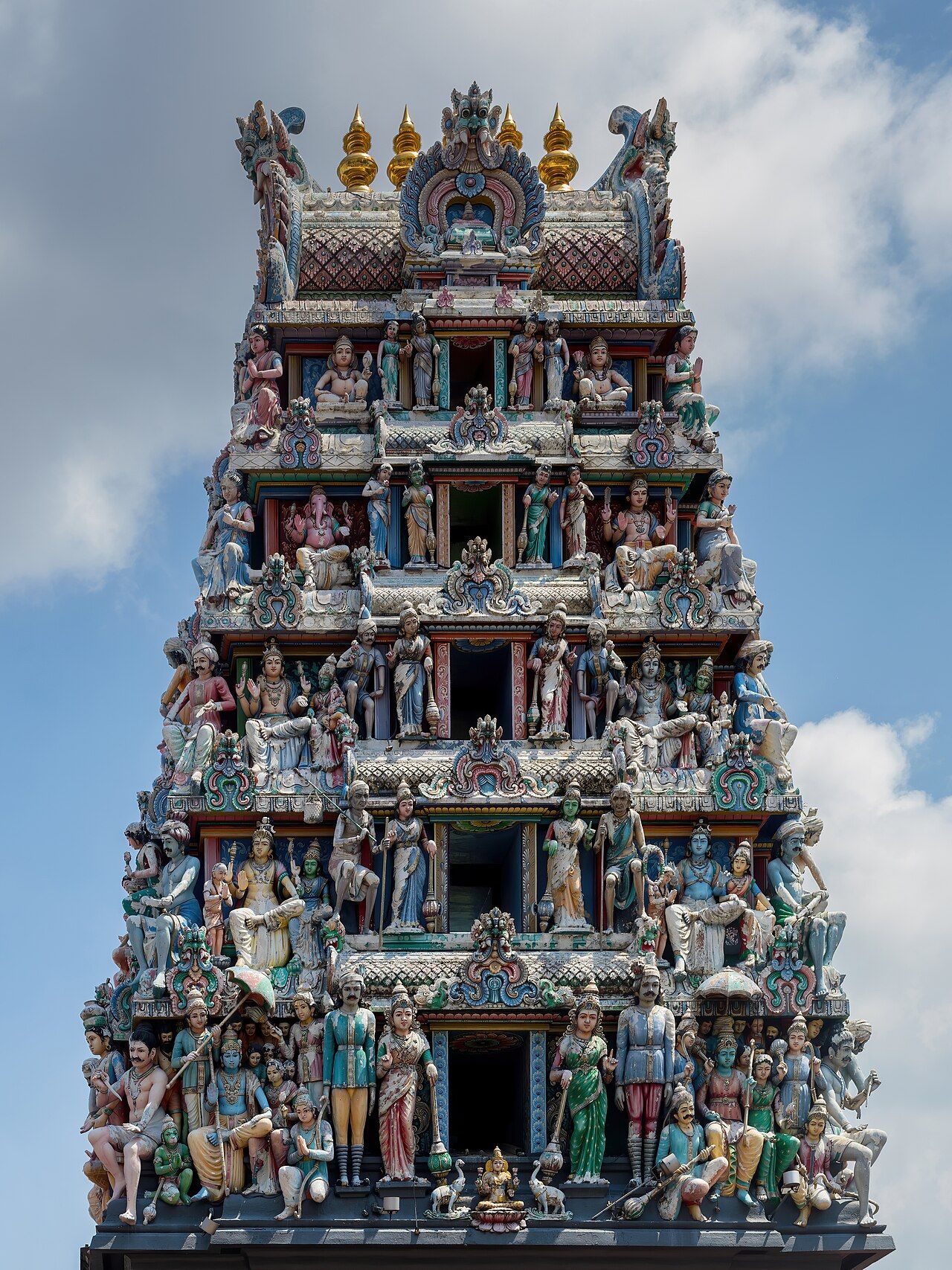 The gopuram of the Sri Mariamman Temple, covered in Hindu deities