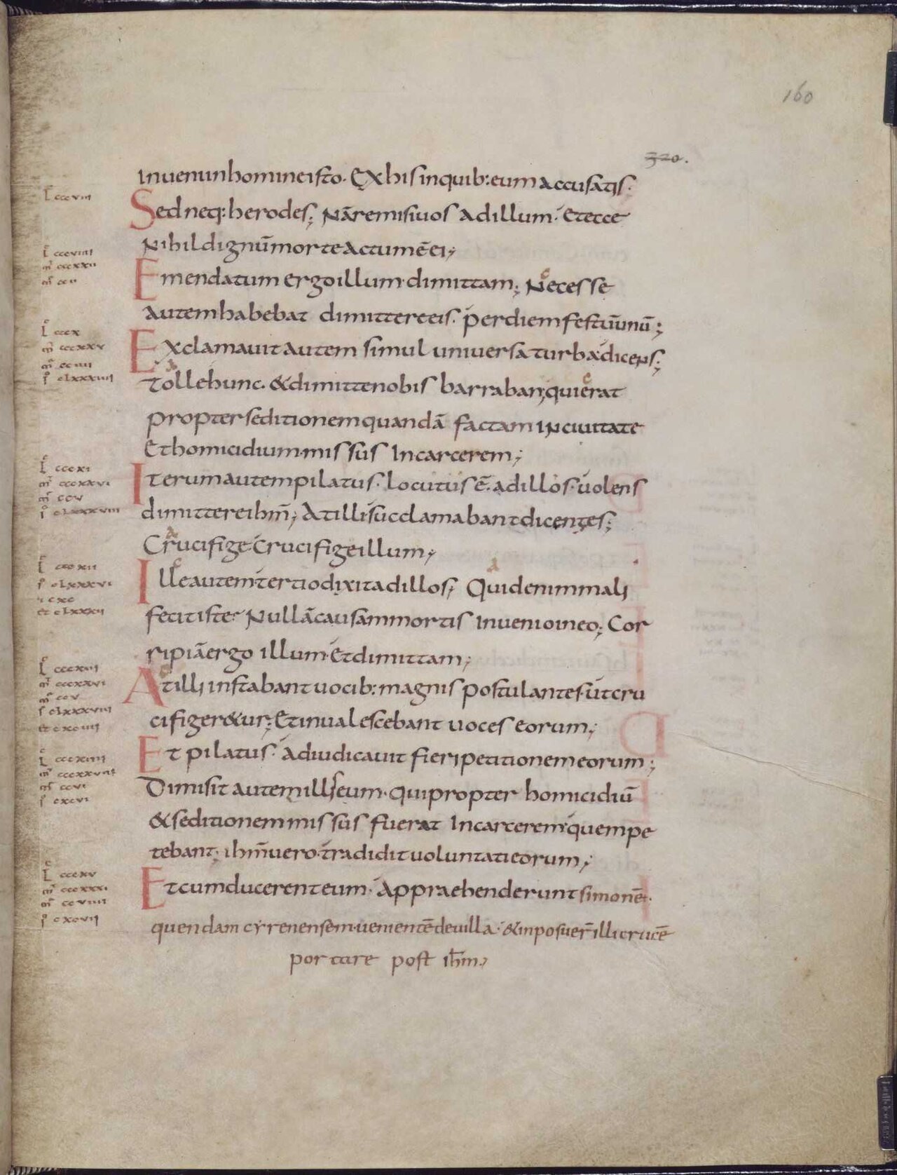 A manuscript page of Luke's Gospel written in Carolingian minuscule, with clear rounded Latin letters and red initials.
