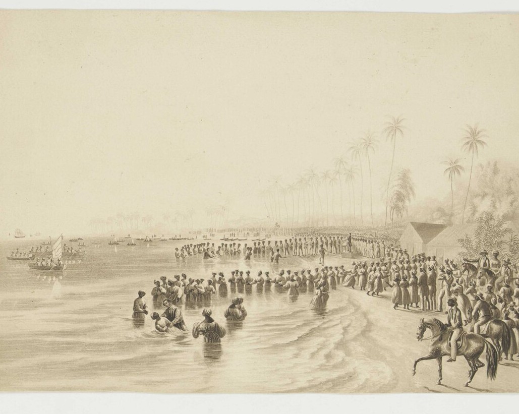 A nineteenth-century print of a Baptist baptism in Jamaica: hundreds of converts baptized by immersion in the sea, crowds watching from the shore.