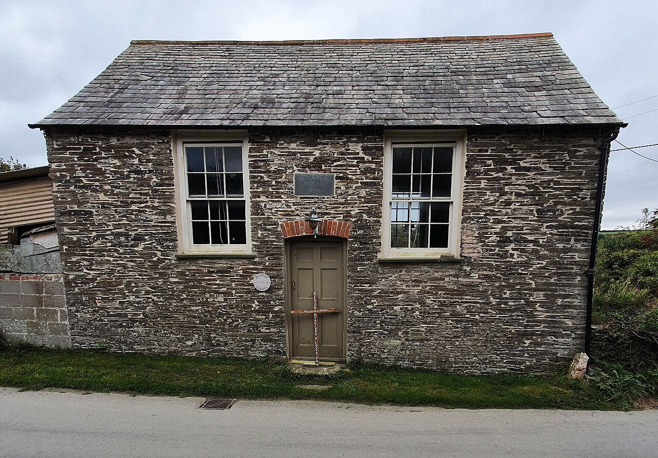 The Penrose Methodist Chapel in Cornwall, a small grey stone chapel under a slate roof.