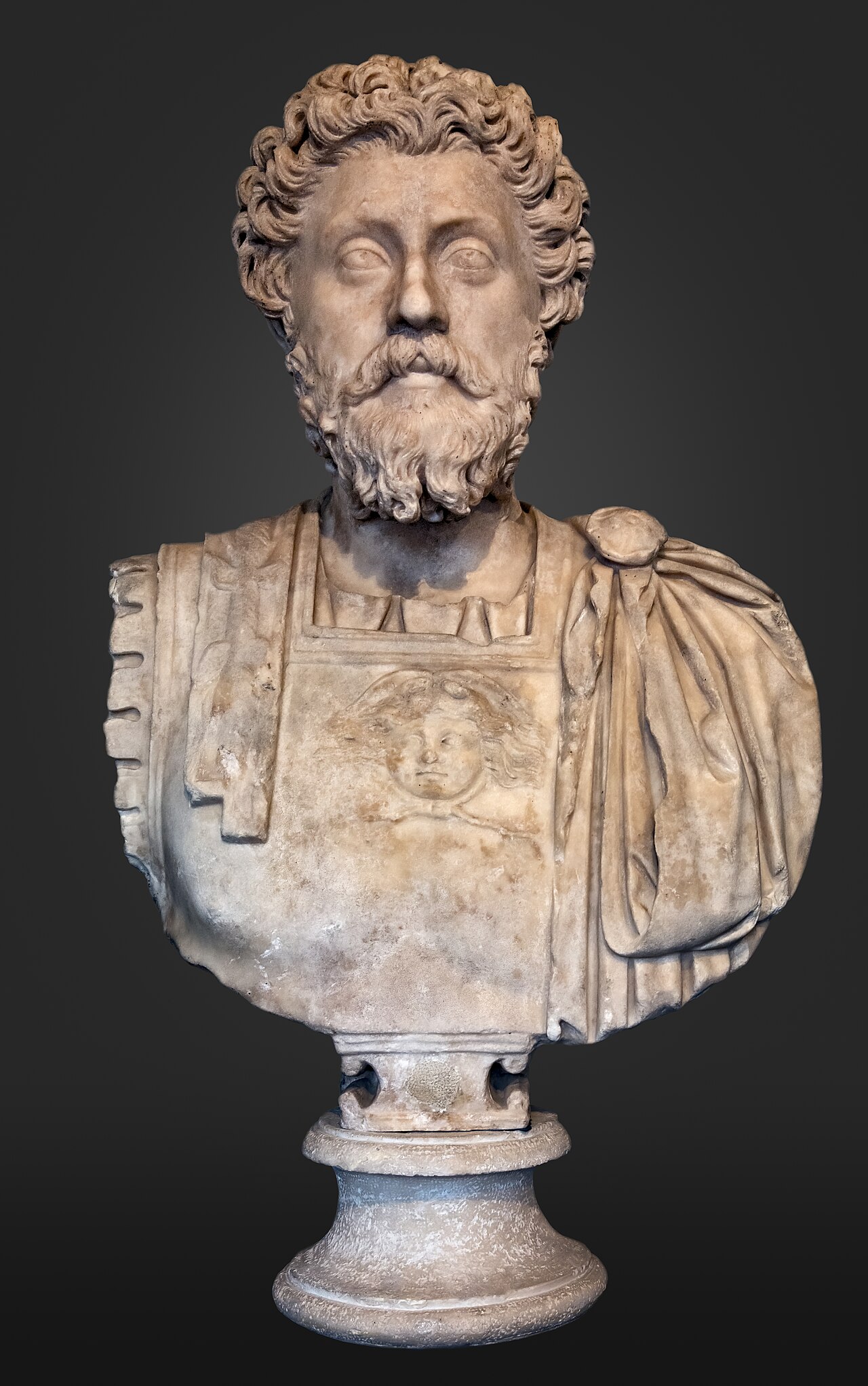 The marble bust of the aged Marcus Aurelius in a breastplate carved with a Gorgon head, in the Musée Saint-Raymond, Toulouse.